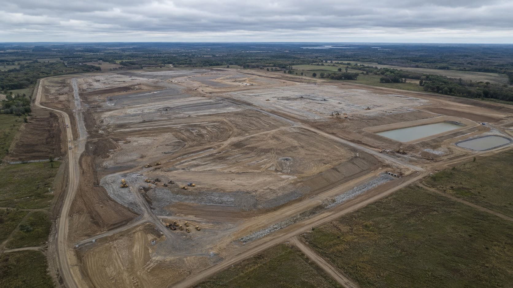 Aerial view of Rivian's Georgia electric vehicle plant site under construction near Social Circle