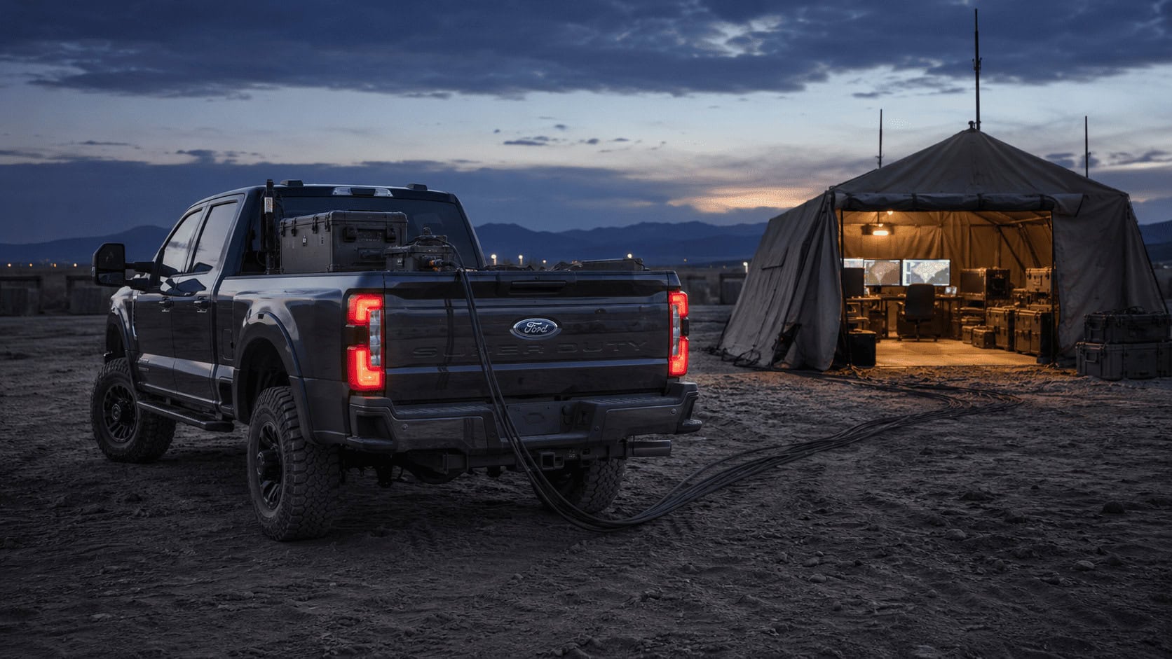 Ford F-Series Super Duty supplying exportable power to military command equipment at a field test site