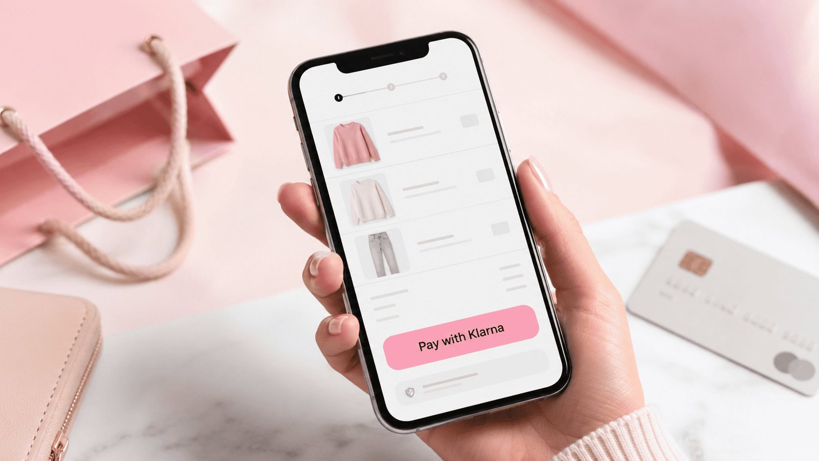 Klarna pink payment button at online checkout on a smartphone, illustrating Klarna's marketing strategy