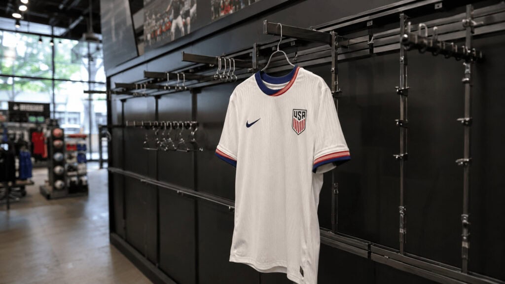 Nearly empty rack of U.S. Soccer national team jerseys at a sporting goods store during the 2026 World Cup