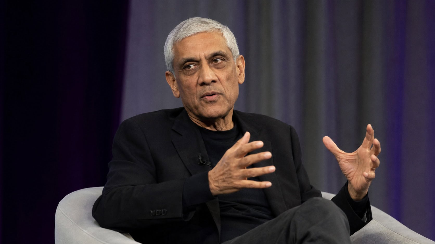 Venture capitalist Vinod Khosla speaking during an on-stage interview.