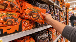Shoppers’ seasonal candy aisle stocked with bags of fun-size chocolate bars ahead of Halloween 2026